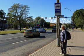 Waiting for bus into Tallinn city centre at Rummu bus stop by Pirita Harbour Camping
